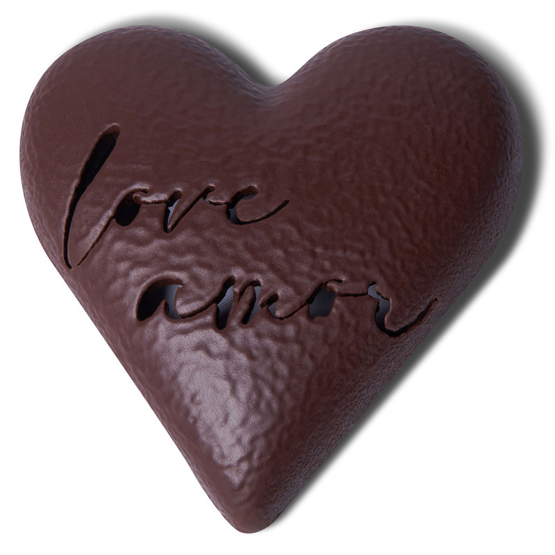 Heart engraved with love in dark chocolate